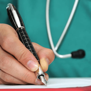 Doctor writing